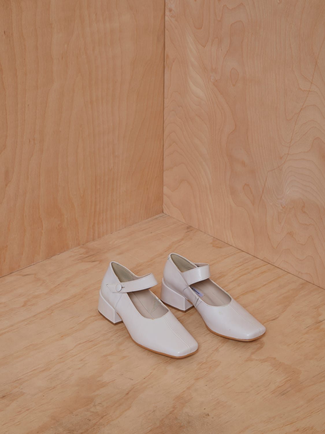 About Arianne Charlotte Glass Mary Jane Shoes in Cream