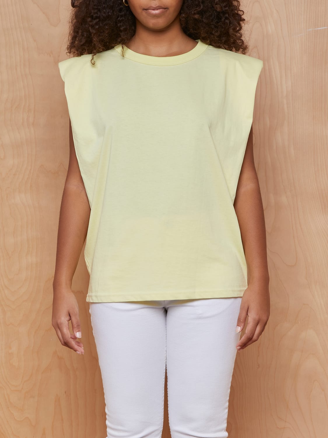 Eva Padded Shoulder Muscle T-Shirt in Pale Yellow by FRANKIESHOP X CAMILLECHARRIÈRE